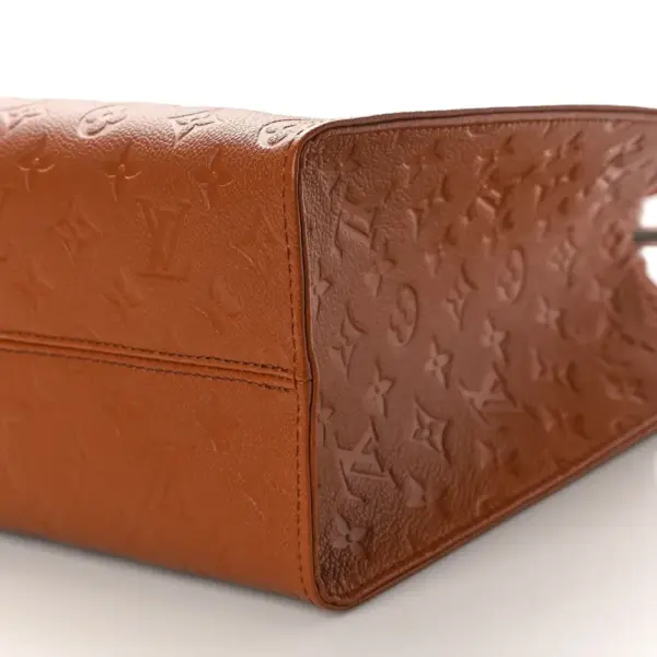 LV Neverfull MM Cognac Giant Monogram Empreinte Leather